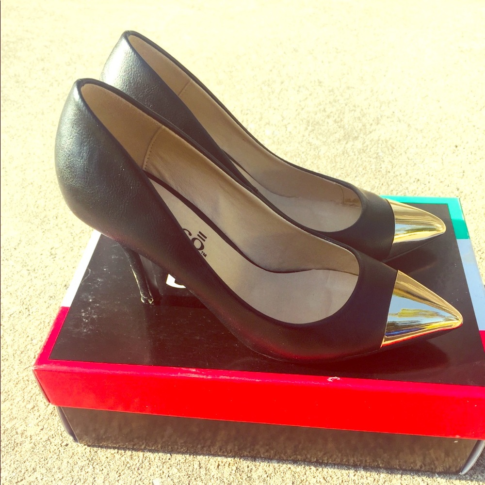 Bucco Cap Toe Black Heels